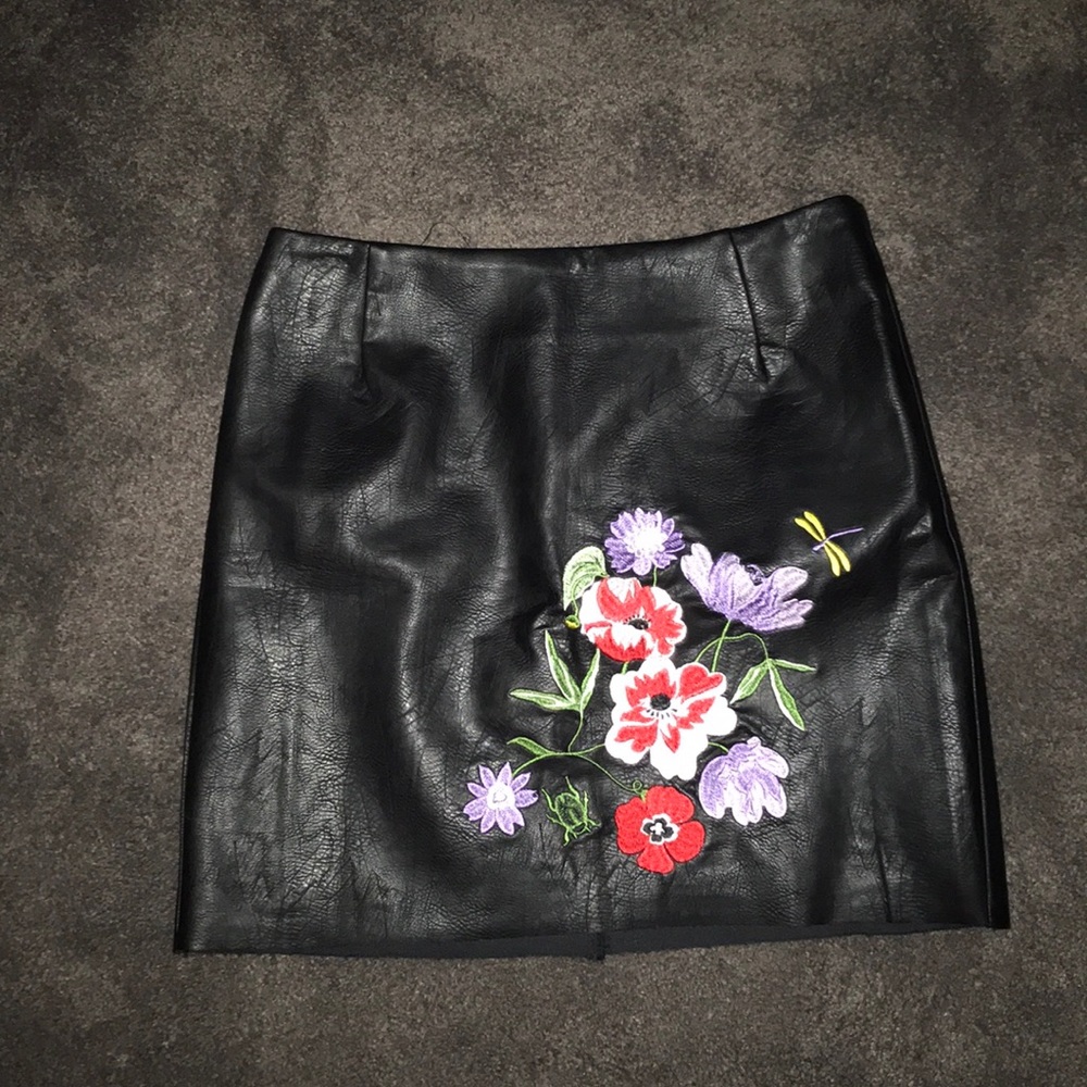 black faux leather embroidered skirt